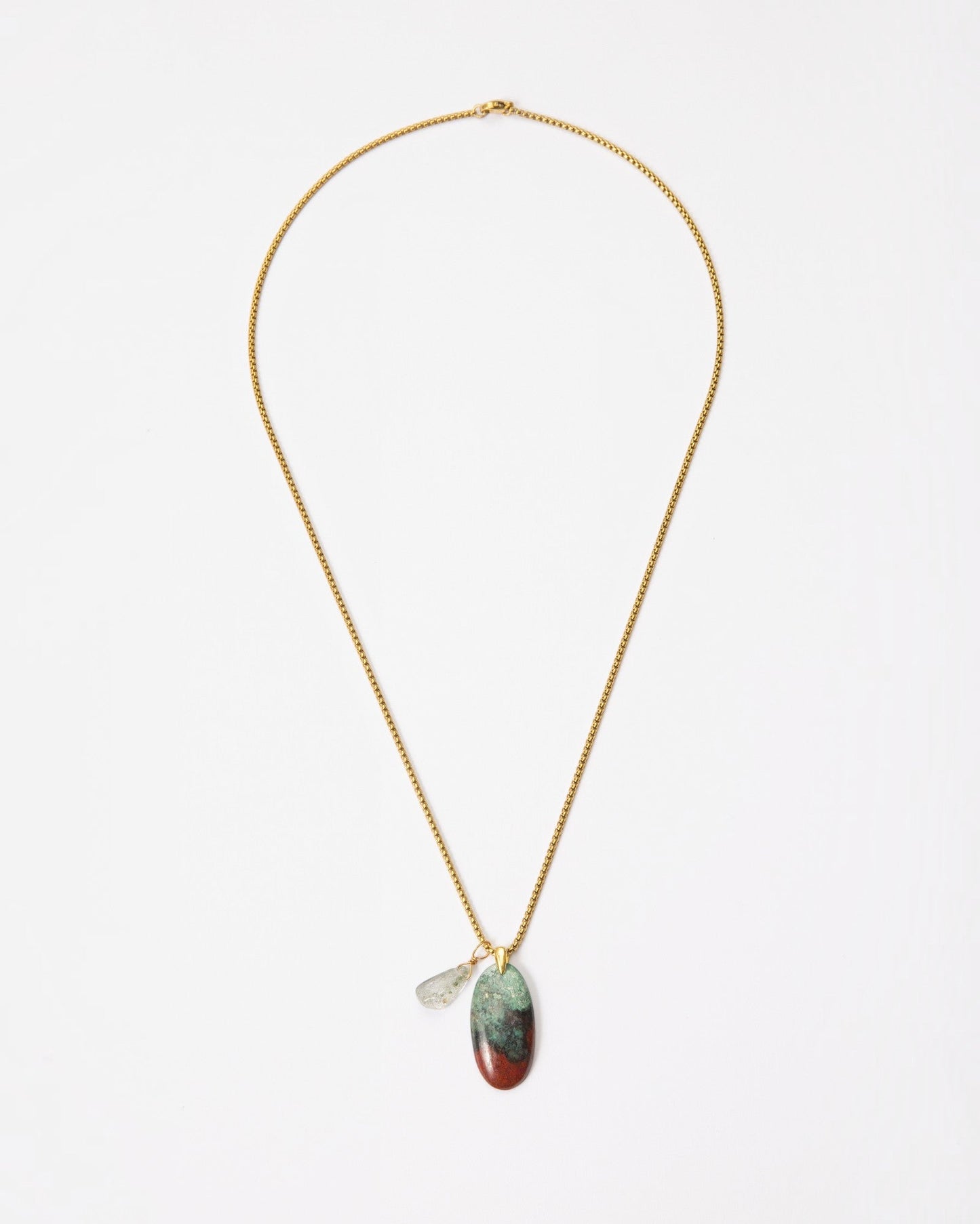 Elsita Jewelry Horizon III necklace featuring a Sonora sunset stone and green quartz pendant on a gold-tone chain.