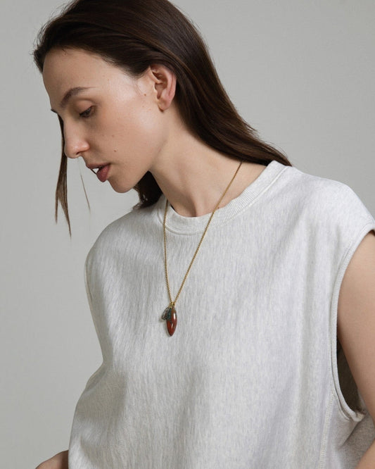 Elsita Jewelry Horizon II necklace featuring a Sonora sunset stone and green quartz pendant on a stainless steel chain.