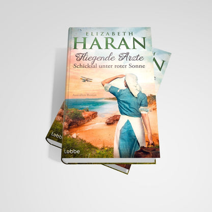 Lübbe Paperback Fliegende Ärzte - Schicksal unter roter Sonne (Deutsch, 2024, Elizabeth Haran)