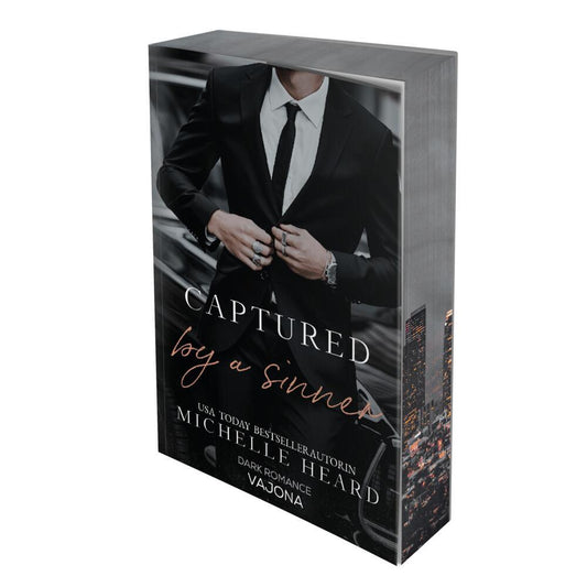 Captured by a Sinner (The Sinners 5) (Michelle Heard)