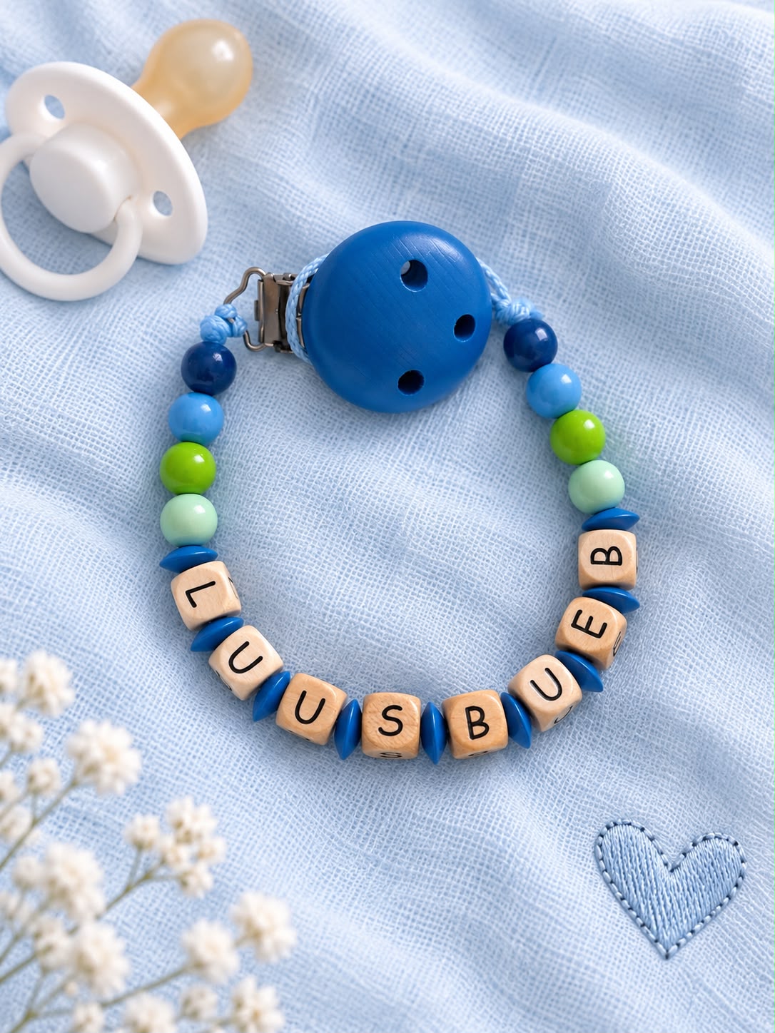 Nuggikette "Luusbueb" (Farbe: blau/grün, Material: Holz)