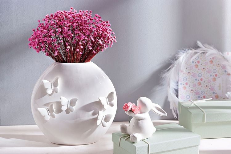 Dekohase Polly mit Blumen