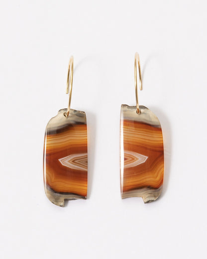 Elsita Jewelry Wild 14 agate earrings featuring raw, freeform banded stone slices on 14K gold-filled hoops.