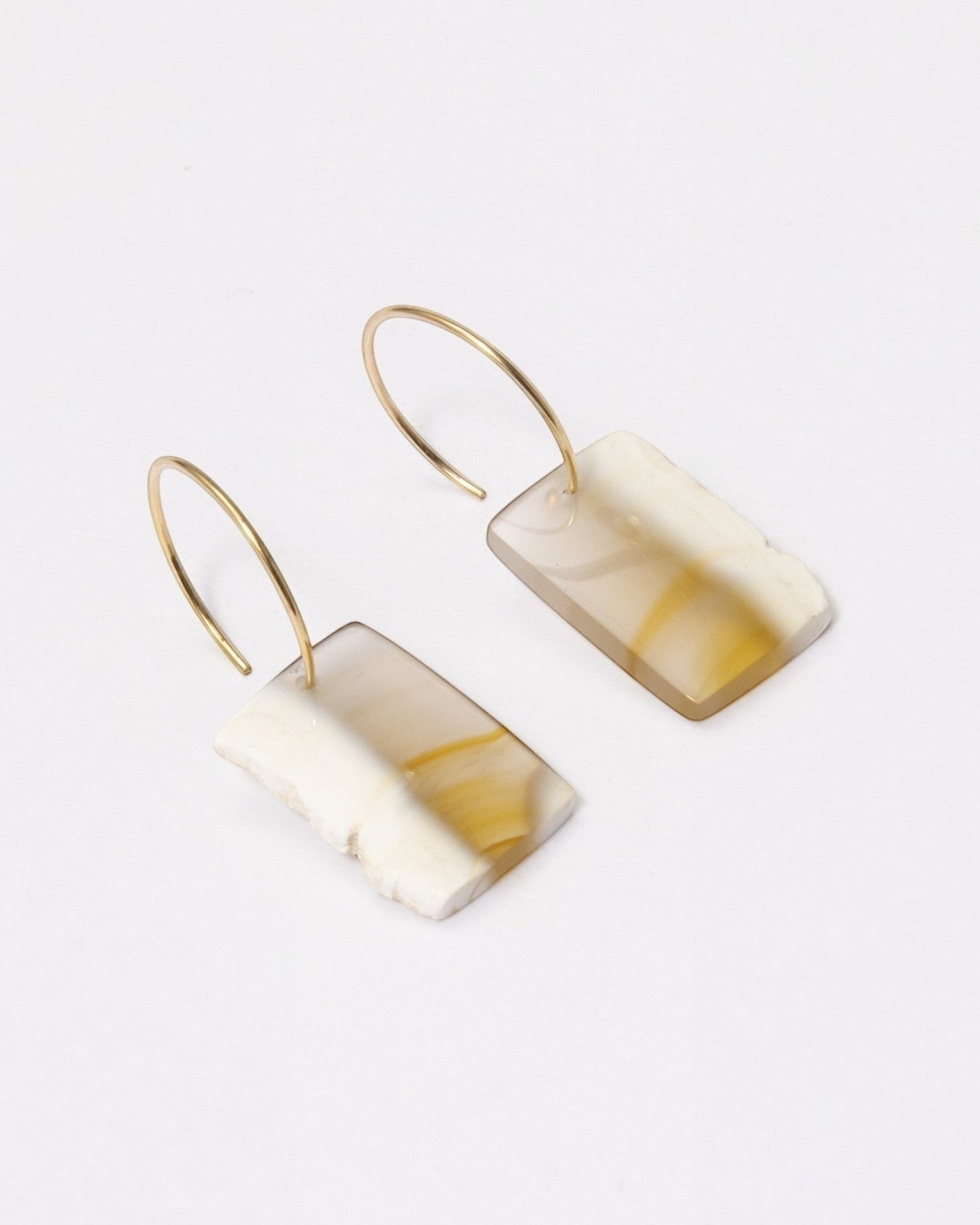 Elsita Jewelry Wild 12 earrings featuring freeform Indonesian agate slices on 14K gold-filled hoops.