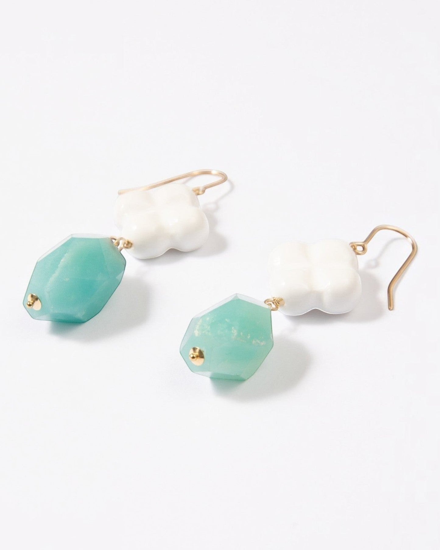 Elsita Jewelry Sky earrings featuring faceted lagoon-blue amazonite and white clover-shaped agate on 14K gold-filled