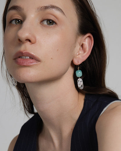 Model wearing Elsita Jewelry Amazonite and Clear Quartz drop earrings with 14K gold-filled accents.