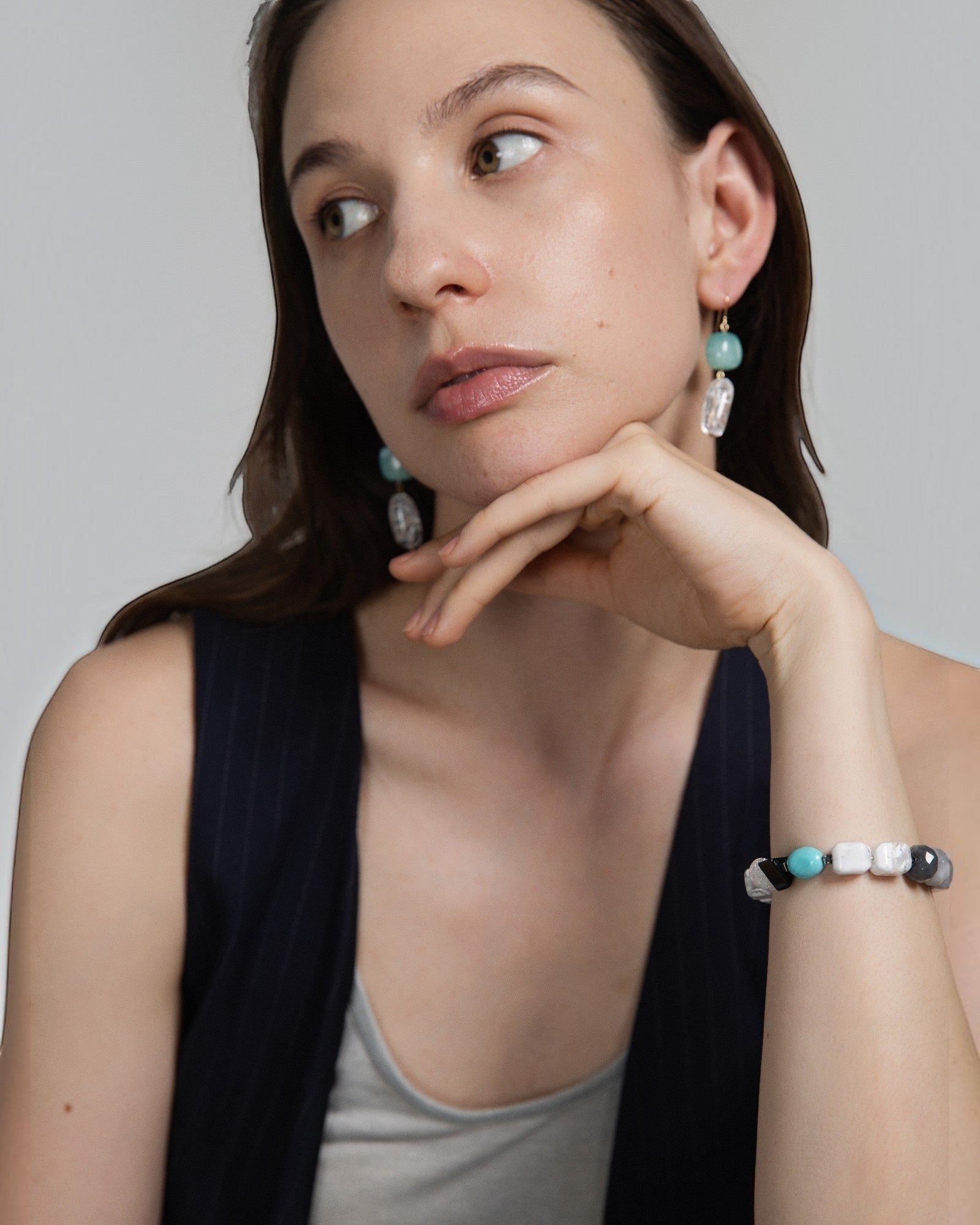 Elsita Jewelry Aqua earrings featuring Amazonite and Clear Quartz beads with 14K gold-filled accents on a model.