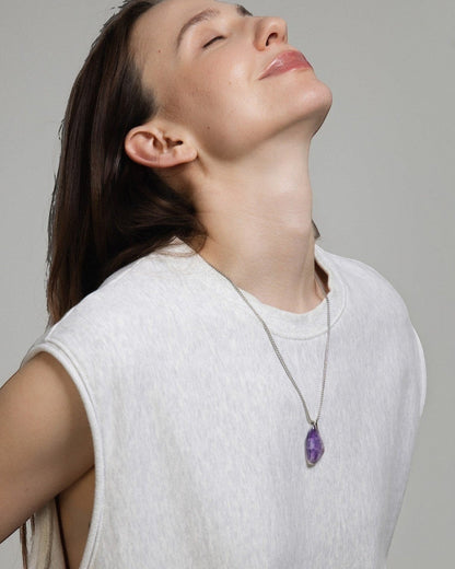 Elsita Jewelry Kaleidoscope III amethyst pendant necklace with sterling silver bail on a stainless steel chain.