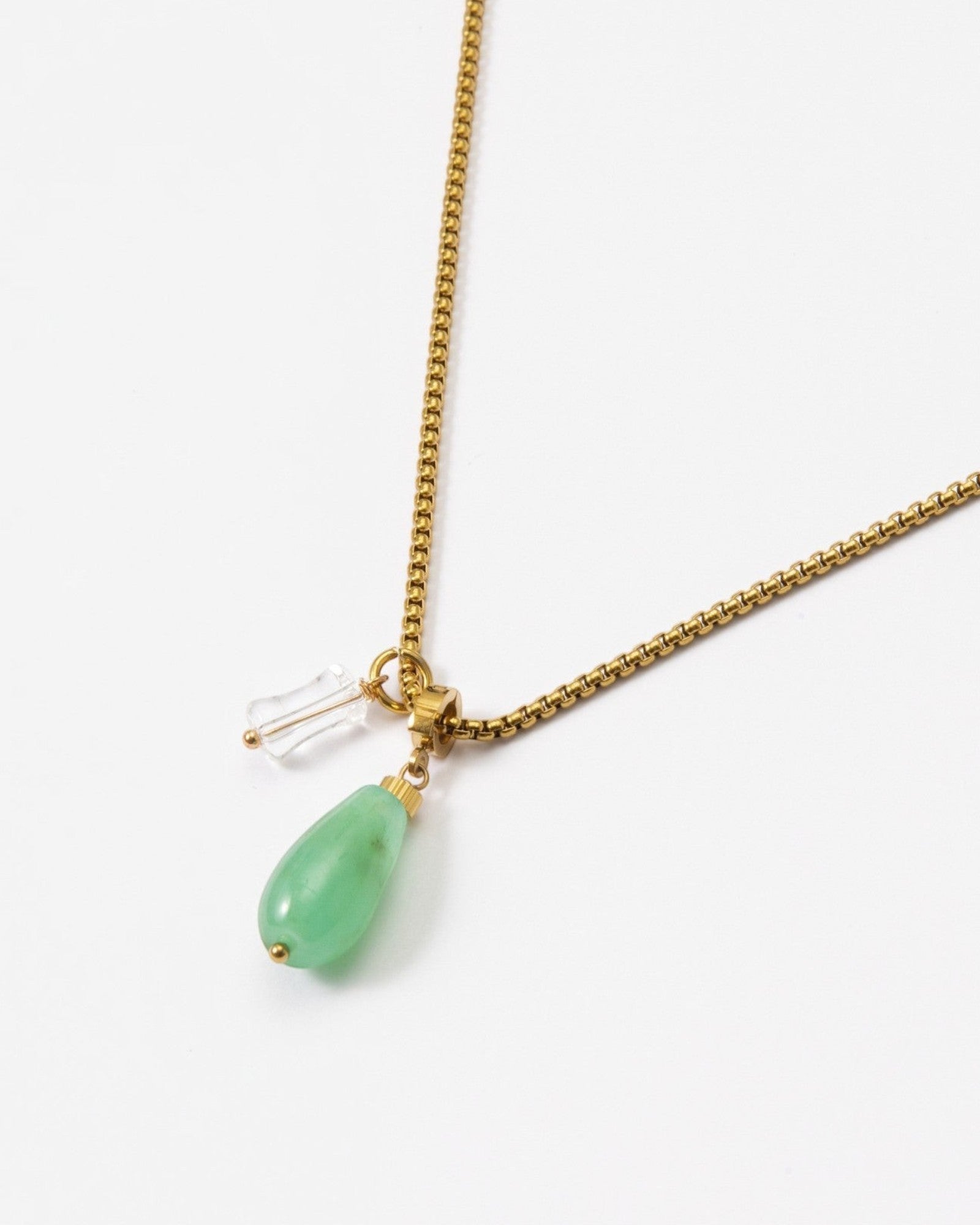 Elsita Jewelry Bamboo necklace featuring a green teardrop chrysoprase and clear quartz pendant on a gold stainless chain