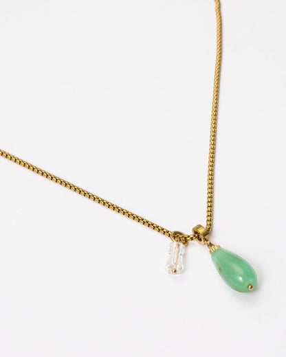 Elsita Jewelry Bamboo necklace featuring a green teardrop chrysoprase and segmented clear quartz on a gold chain.