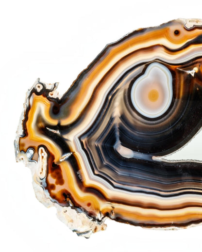 Elsita Jewelry Macchiato banded agate stone with caramel brown, smoky grey, and white mineral layers.