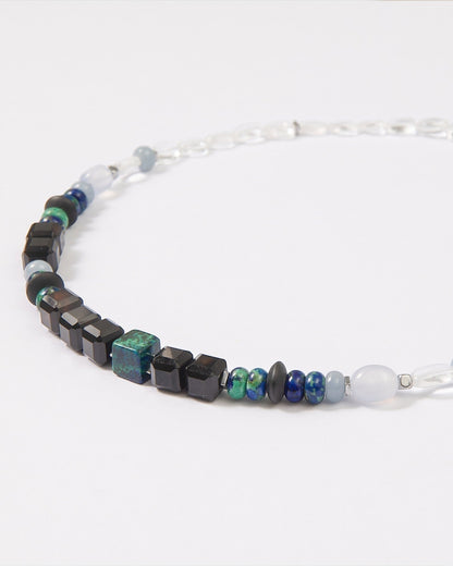 Elsita Jewelry Blausee Deep necklace featuring faceted black agate, chrysocolla, and blue chalcedony mineral beads.