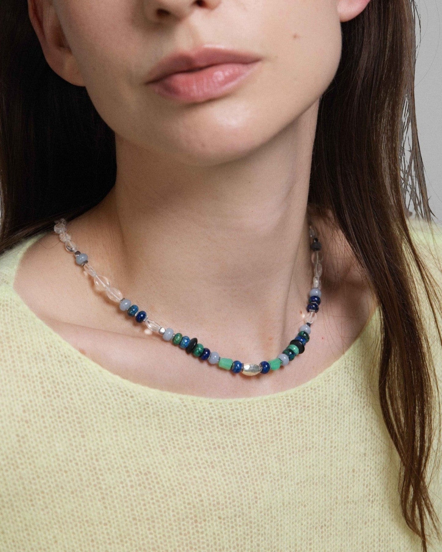 Elsita Jewelry Blausee Light necklace featuring mixed Chrysocolla, Chrysoprase, and Clear Quartz beads on a model.