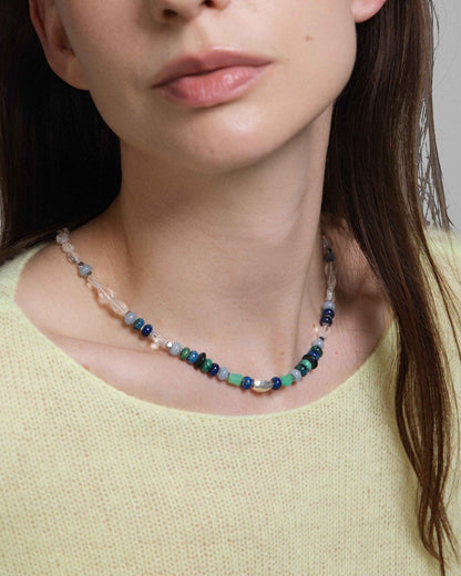 Elsita Jewelry Blausee Light necklace featuring mixed Chrysocolla, Chrysoprase, and Clear Quartz beads on a model.