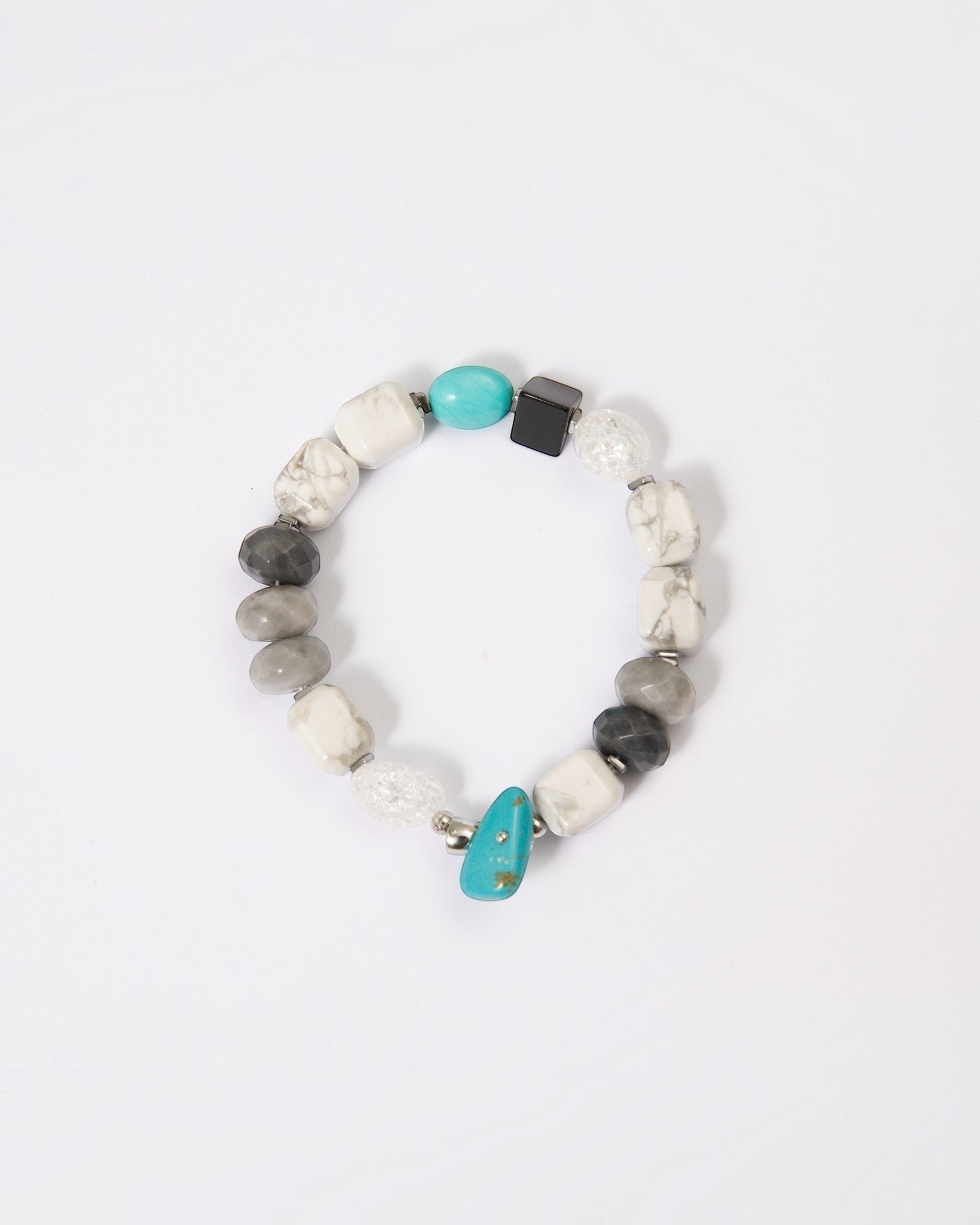Elsita Jewelry Chill bracelet featuring turquoise, howlite, agate, and quartz beads in a cool-toned mineral composition.