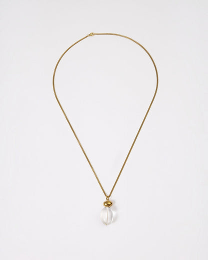 Elsita Jewelry Lustre I necklace featuring a clear quartz pendant on a gold-tone stainless steel chain