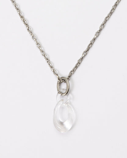 Elsita Jewelry Link Clear necklace featuring a hand-carved clear quartz interlocked chain pendant on a silver-tone chain.