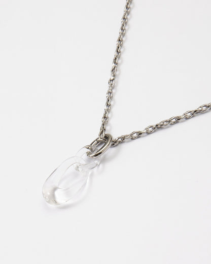 Elsita Jewelry Link Clear necklace featuring a hand-carved clear quartz interlocked chain pendant on a silver chain.
