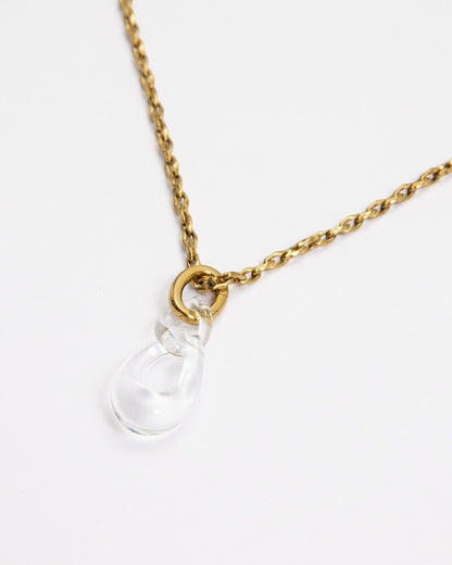 Elsita Jewelry Link Clear necklace featuring a hand-carved clear quartz interlocked chain pendant on a gold-tone chain.