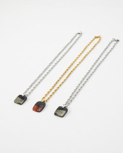 Elsita Jewelry Dune Day necklaces featuring square stone pendants on gold and silver link chains