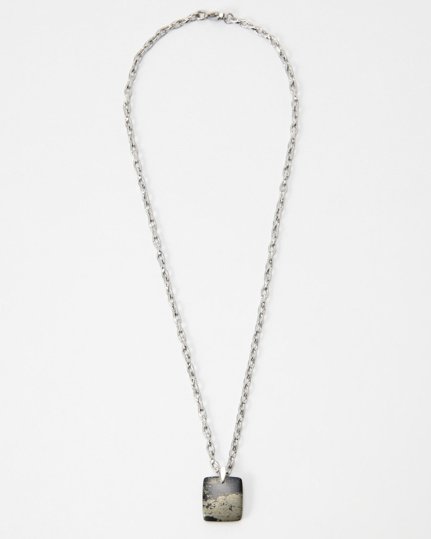 Elsita Jewelry Dune Night necklace featuring a square grey and black stone pendant on a silver chain