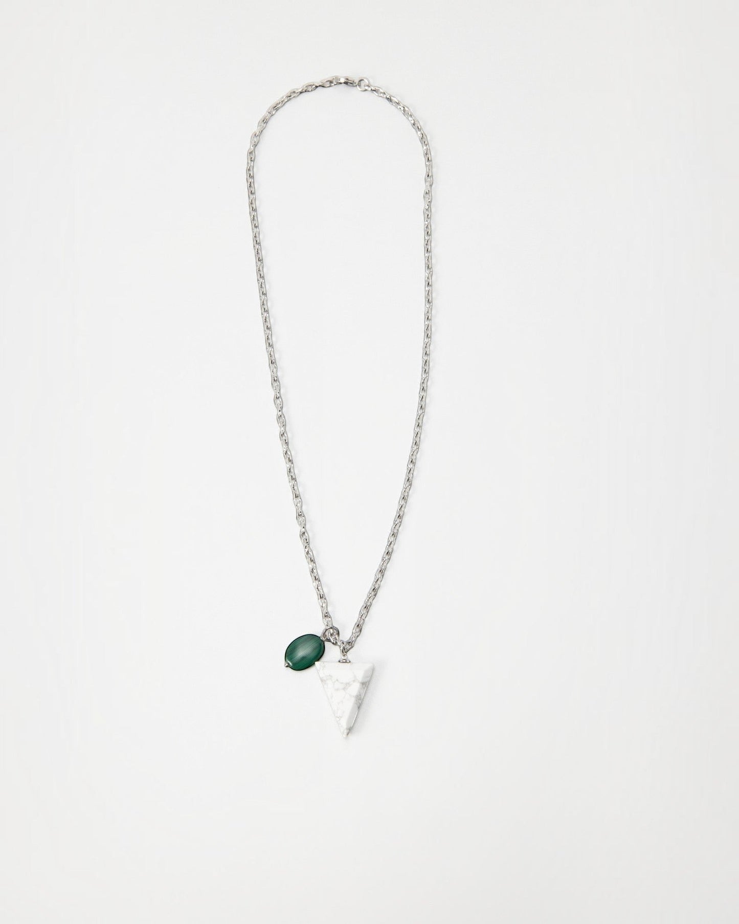 Elsita Jewelry Forest necklace featuring a white marble triangle pendant and a green stone charm on a silver chain.