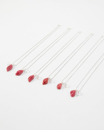 Elsita Jewelry Fuchsia necklaces featuring small red teardrop pendants on delicate silver chains