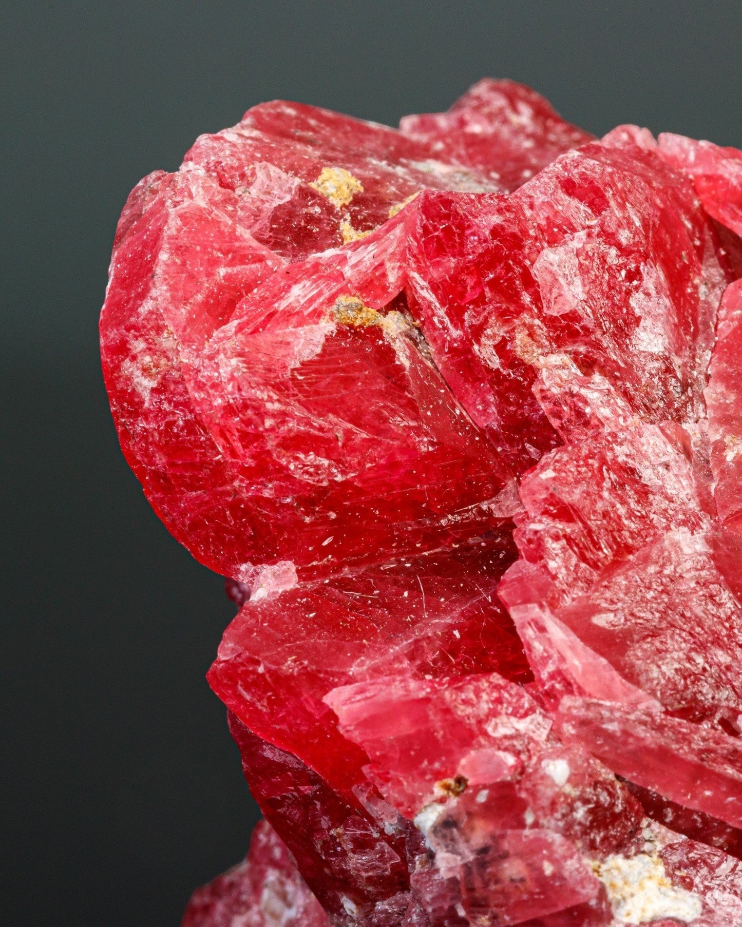 Elsita Jewelry fuchsia rhodonite gemstone with raw crystalline texture and vivid magenta mineral formations