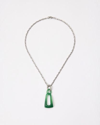 Elsita Jewelry Link Green necklace featuring a hand-carved green agate interlocked chain pendant on a silver chain.