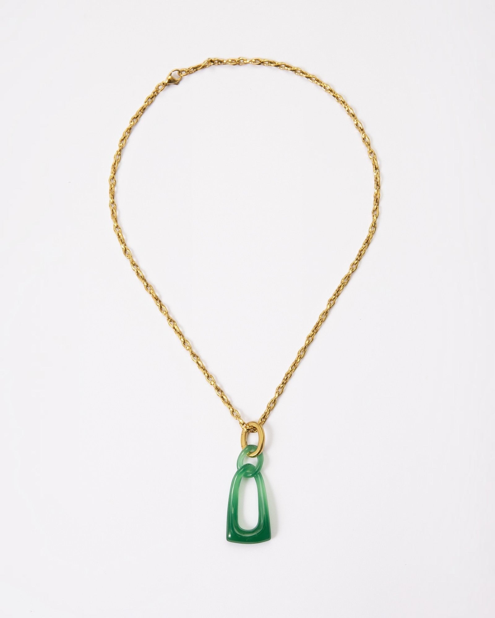 Elsita Jewelry Link Green necklace featuring hand-carved interlocked green agate chain links on a gold-tone metal chain.