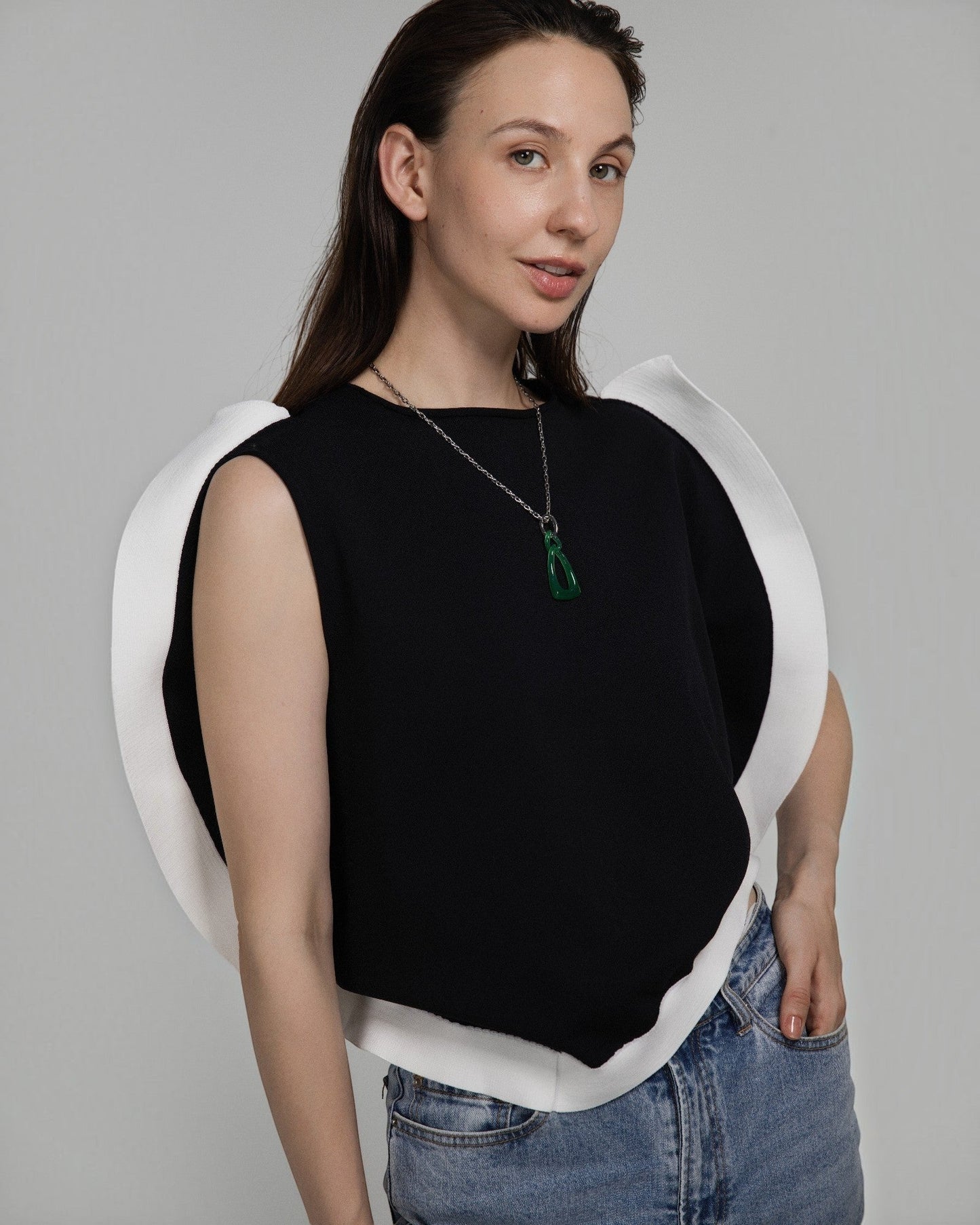 Model wearing an Elsita Jewelry green agate interlocked chain pendant necklace on a silver-tone stainless steel chain.