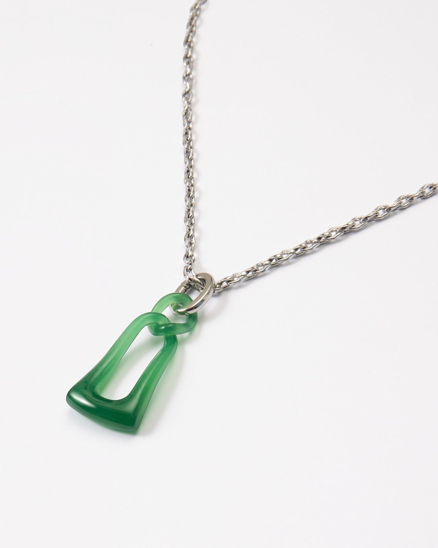 Elsita Jewelry green agate pendant necklace featuring two hand-carved interlocked stone chain links on a silver chain.