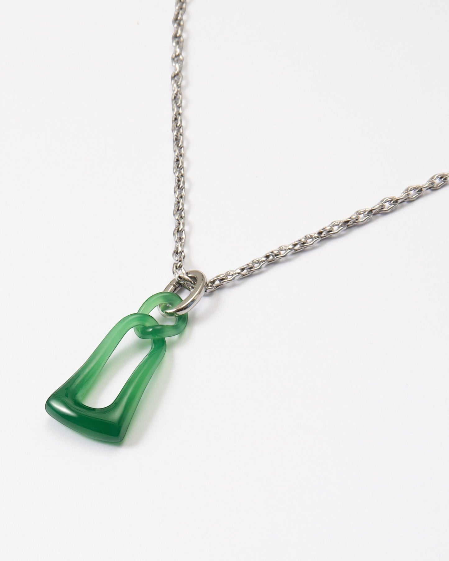 Elsita Jewelry Link Green necklace featuring a hand-carved interlocked green agate chain pendant on a silver chain.