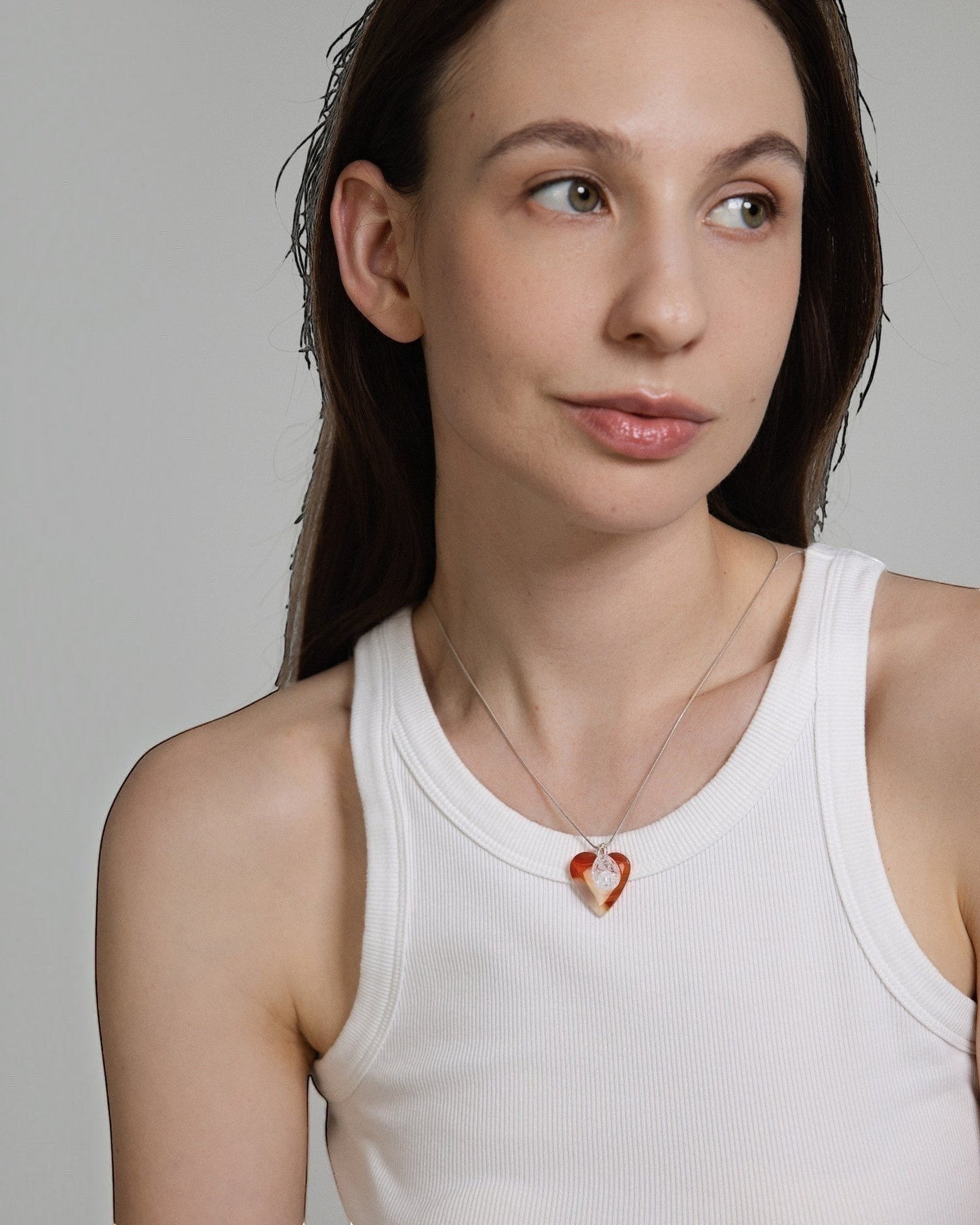 Elsita Jewelry Soda I heart-shaped red agate and clear quartz pendant necklace on a sterling silver snake chain