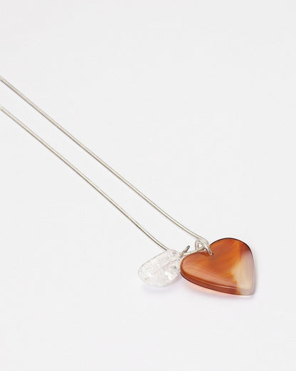 Elsita Jewelry Soda I heart-shaped red agate and clear quartz pendant necklace on a sterling silver snake chain.