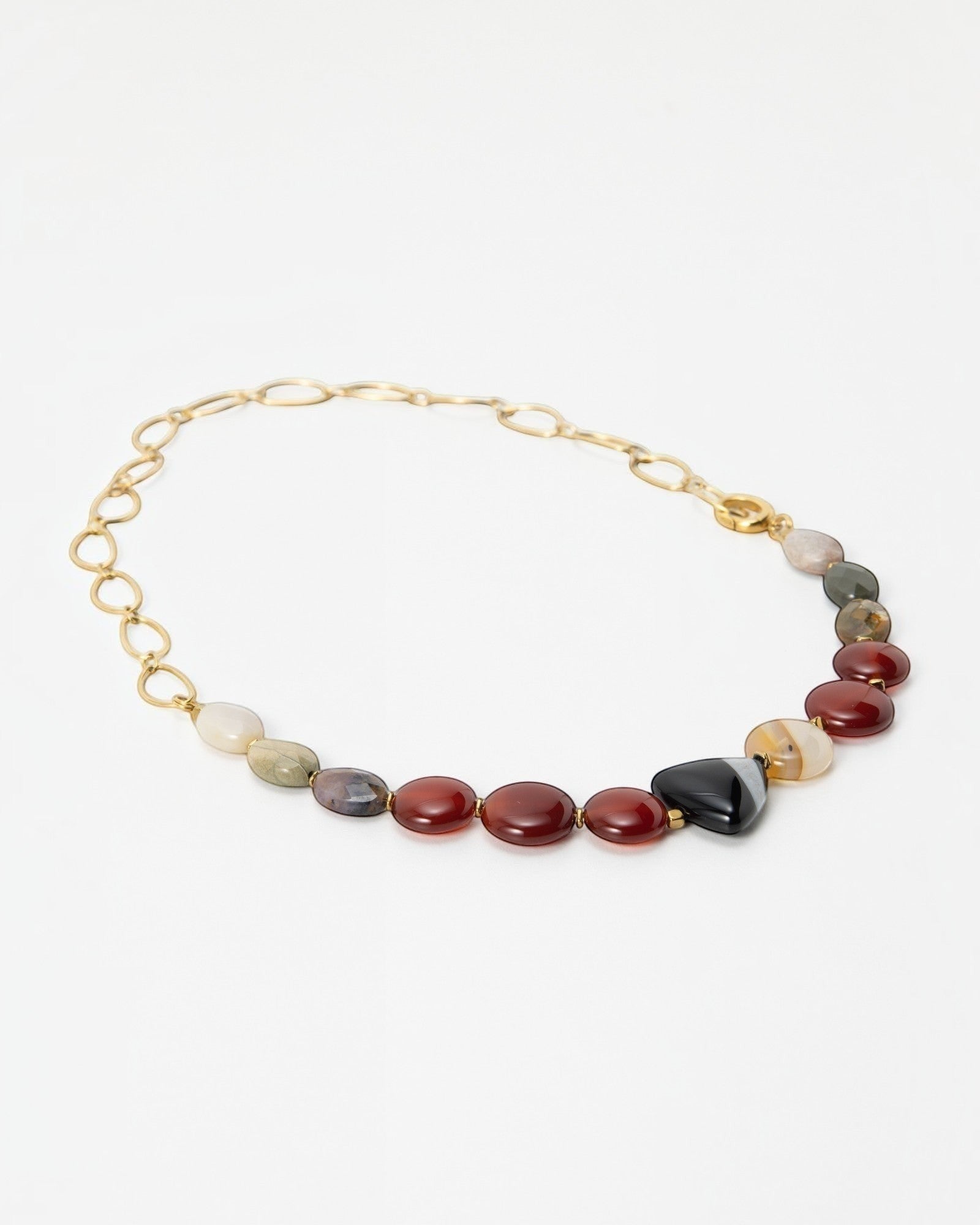 Elsita Jewelry Herbst necklace featuring multicolored polished gemstone beads on a delicate gold chain