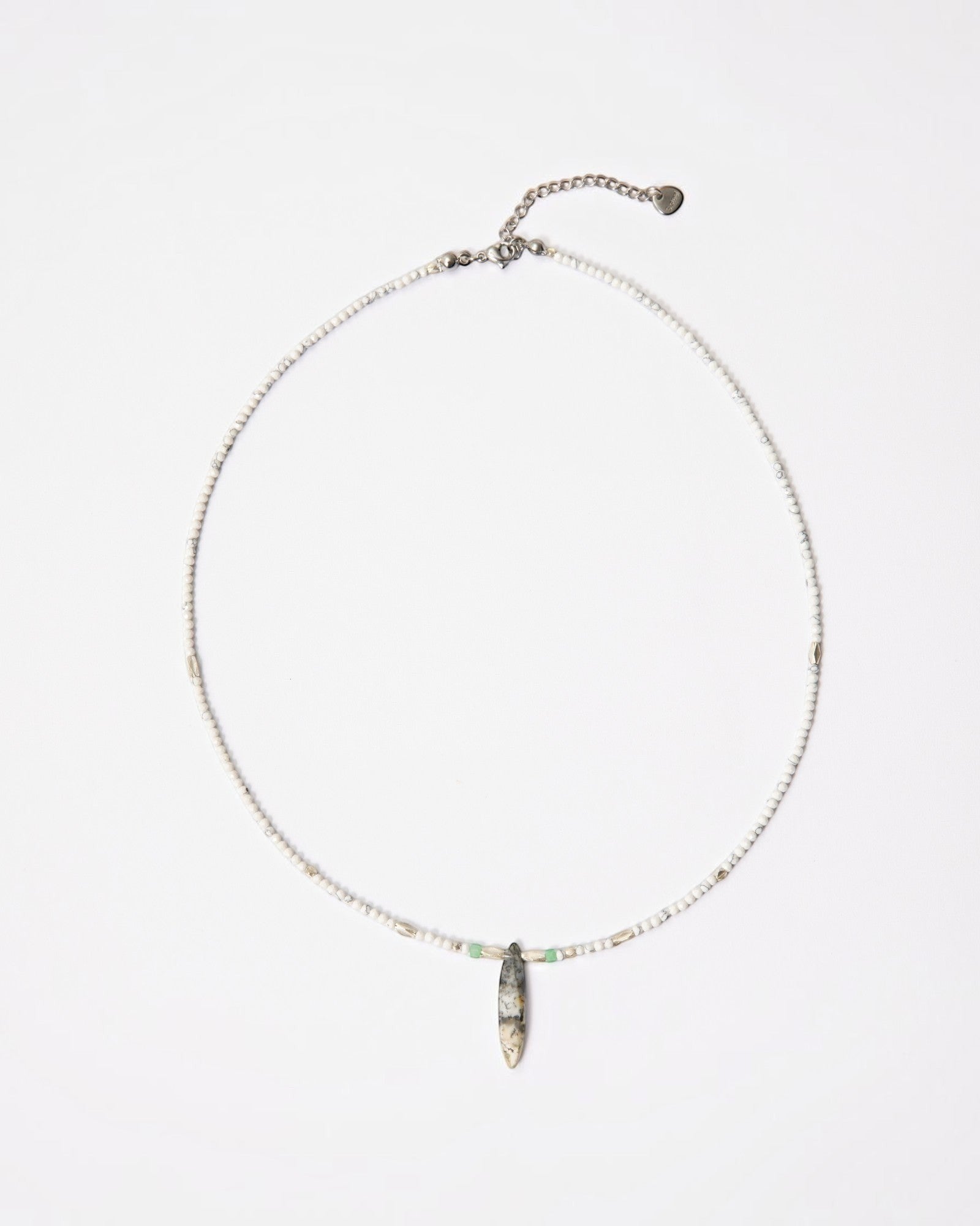 Elsita Jewelry Snowline Grey necklace featuring white howlite beads, grey agate pendant, and sterling silver accents.