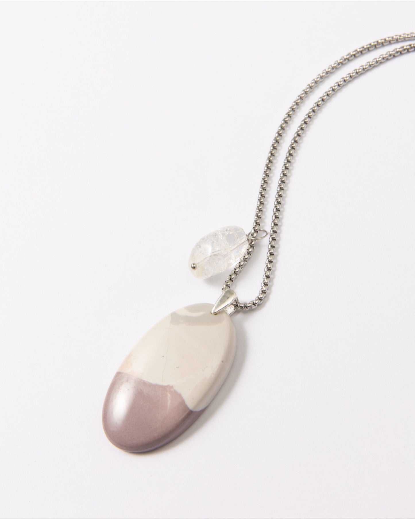 Elsita Jewelry Mauve II pendant necklace featuring a smooth Hyacinth Jasper stone in lavender and white with clear quartz.