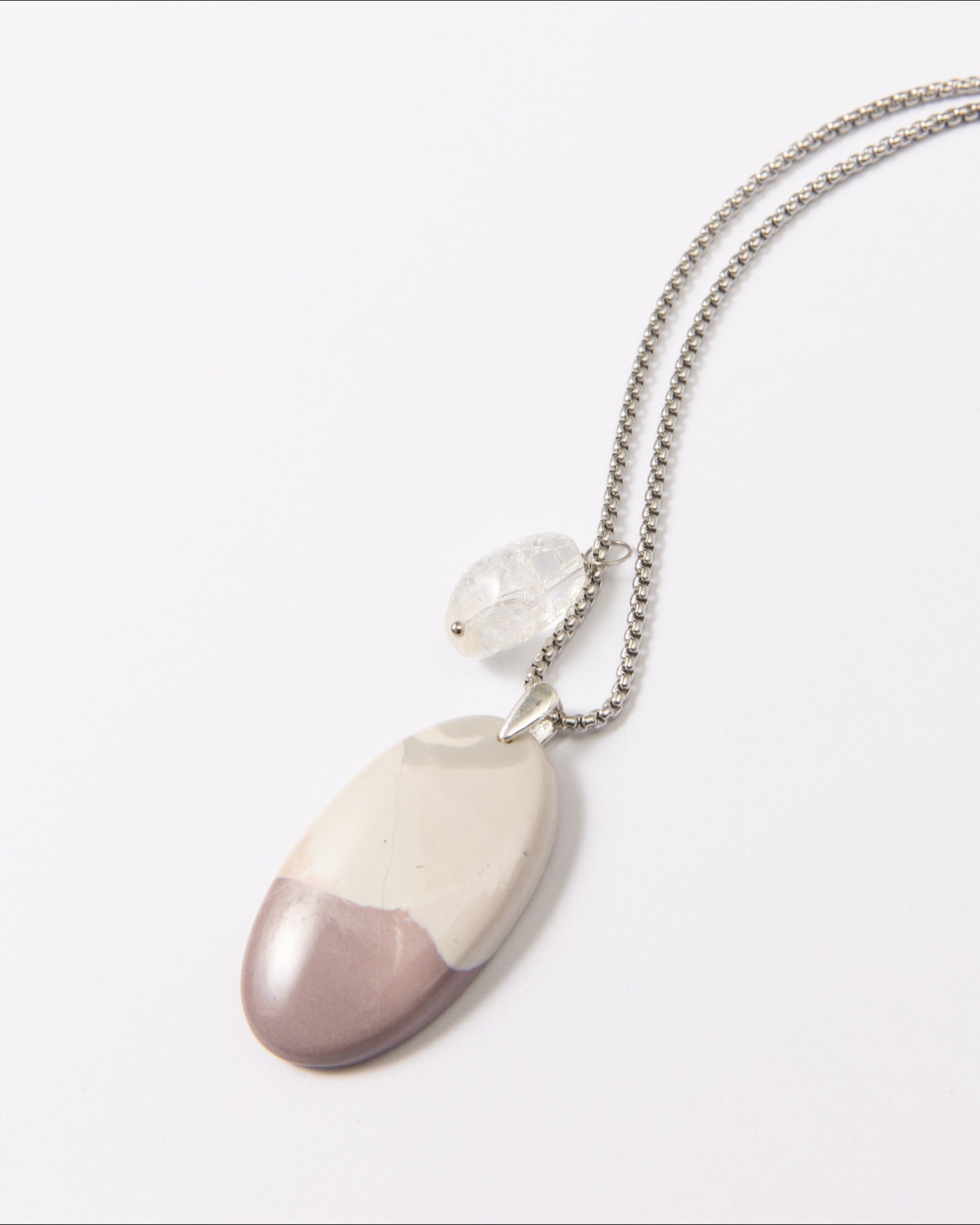 Elsita Jewelry Mauve II pendant necklace featuring a smooth Hyacinth Jasper stone in lavender and white with clear quartz.