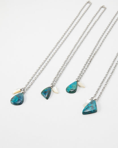 Elsita Jewelry Lagoon II necklaces featuring blue azurite-malachite pendants and small white shell accents on silver chains