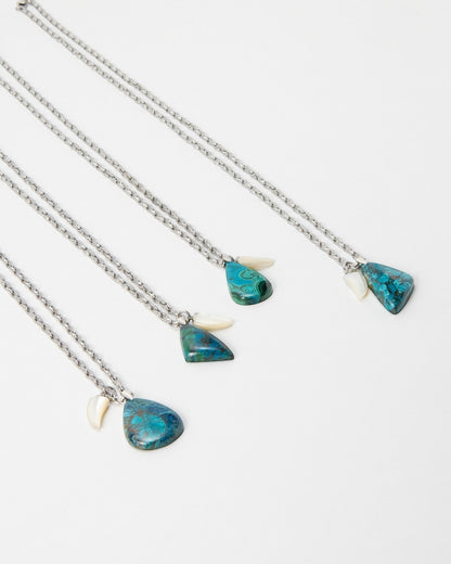 Elsita Jewelry Lagoon III necklaces featuring teal and blue azurite malachite stones with white shell accents on silver chains.
