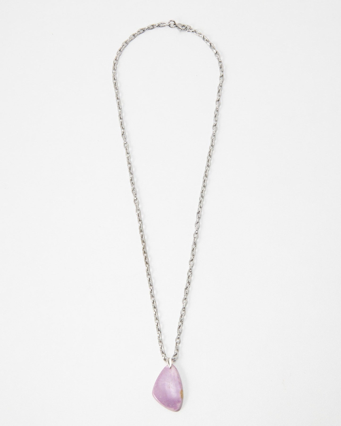 Elsita Jewelry Lilac necklace featuring a smooth, irregular lilac-colored stone pendant on a silver chain.