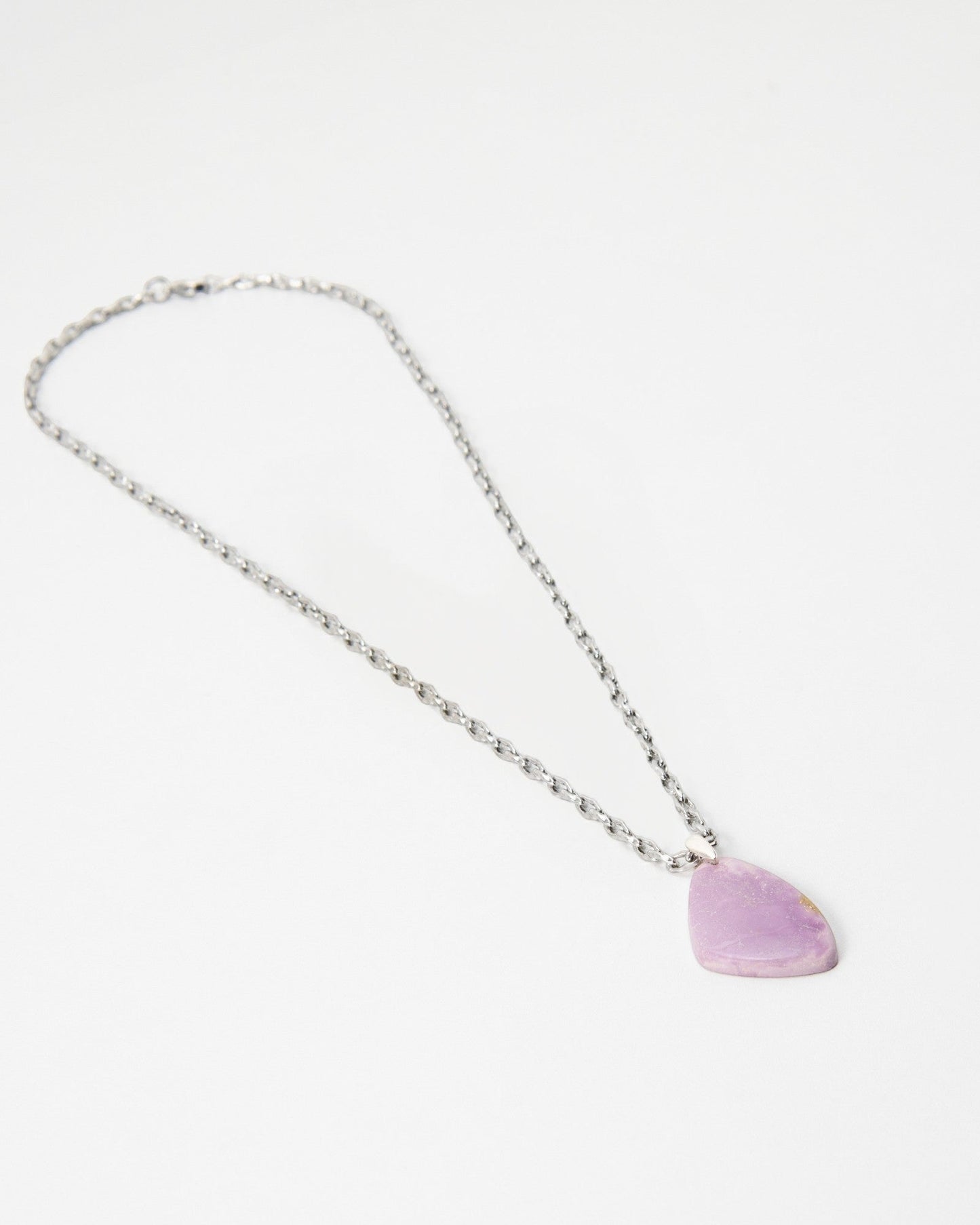 Elsita Jewelry Lilac necklace featuring a smooth, irregular light purple stone pendant on a silver chain.