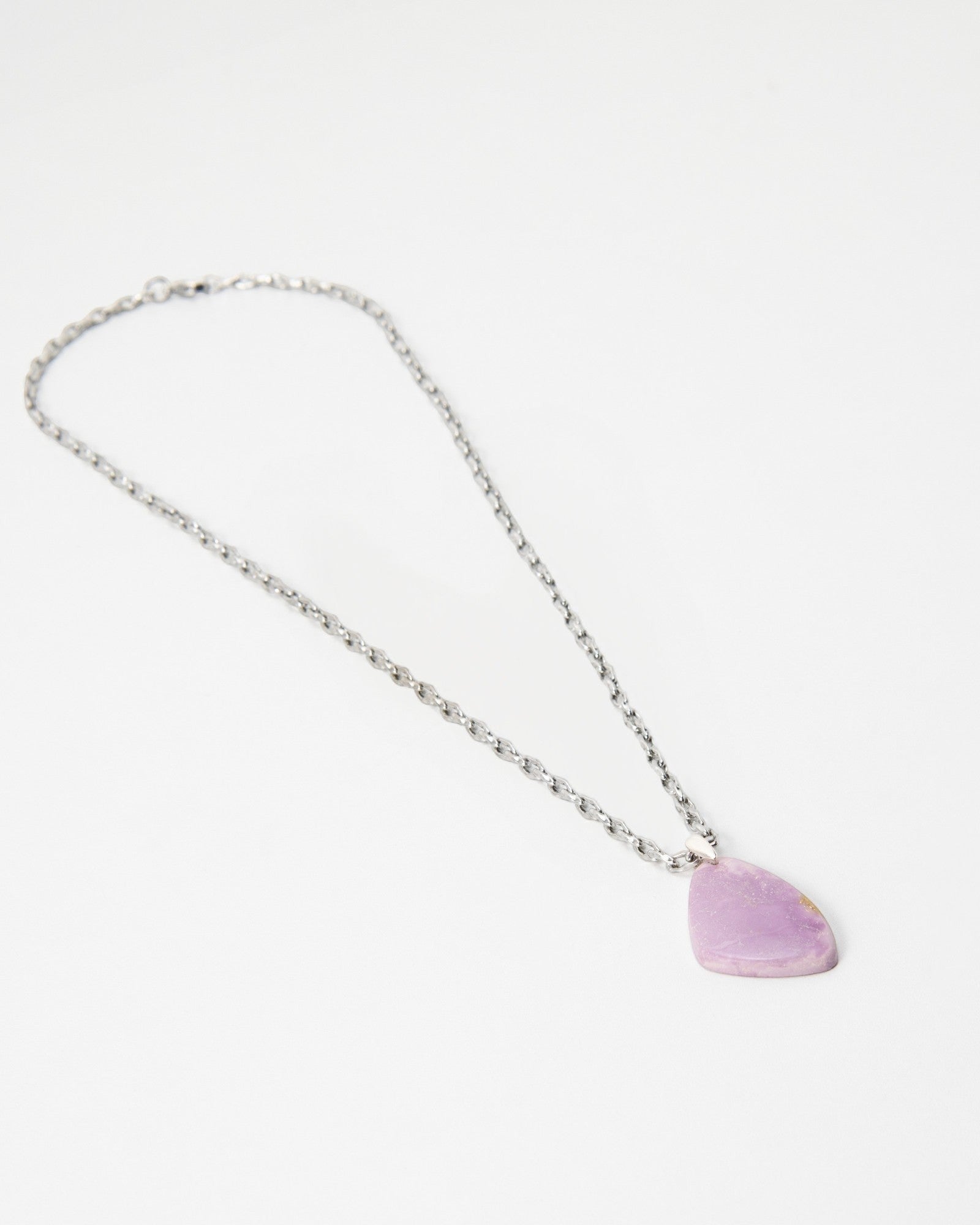 Elsita Jewelry Lilac necklace featuring a smooth, irregular light purple stone pendant on a silver chain.