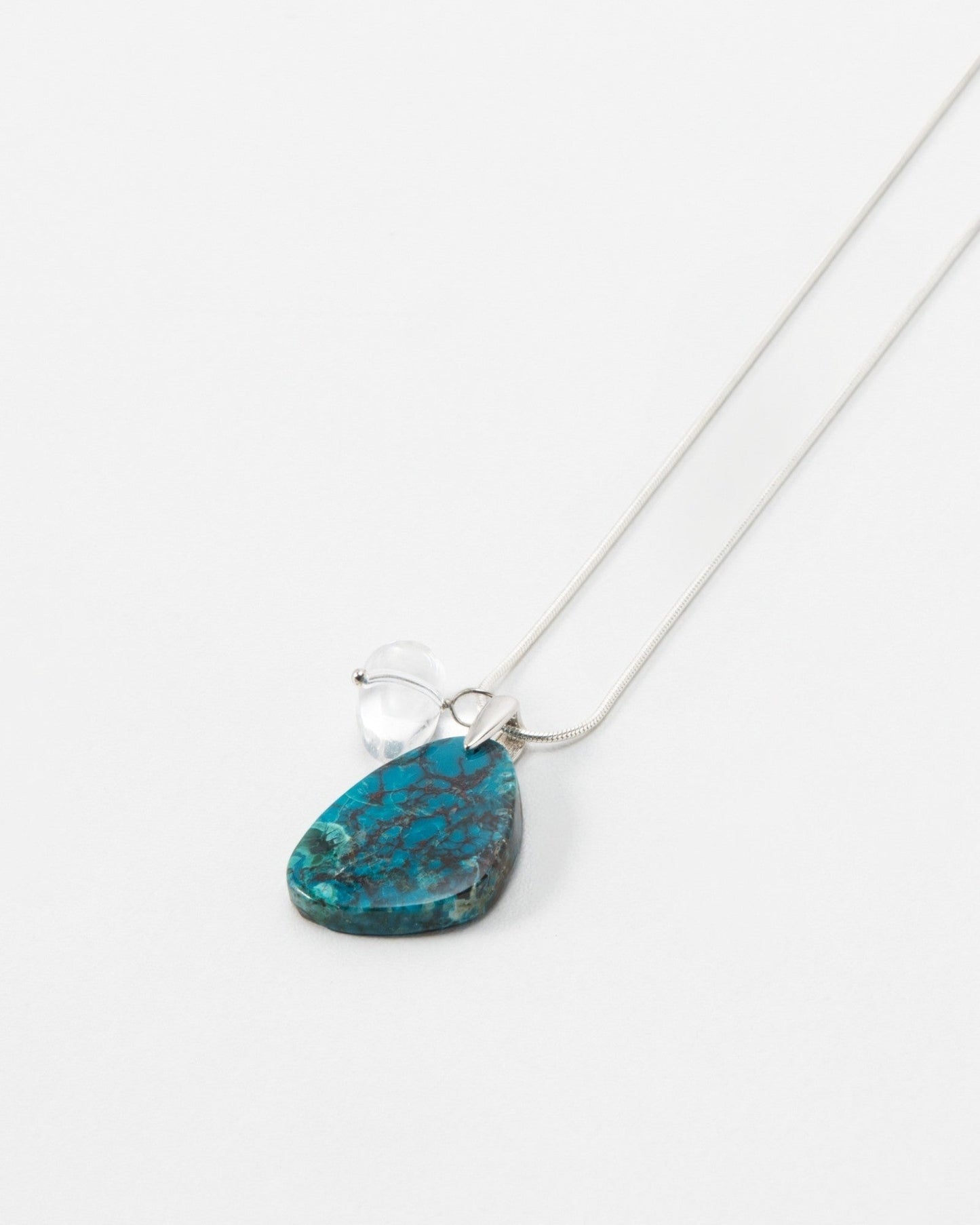 Elsita Jewelry Marine necklace featuring a teardrop-shaped blue and green gemstone pendant on a delicate silver chain