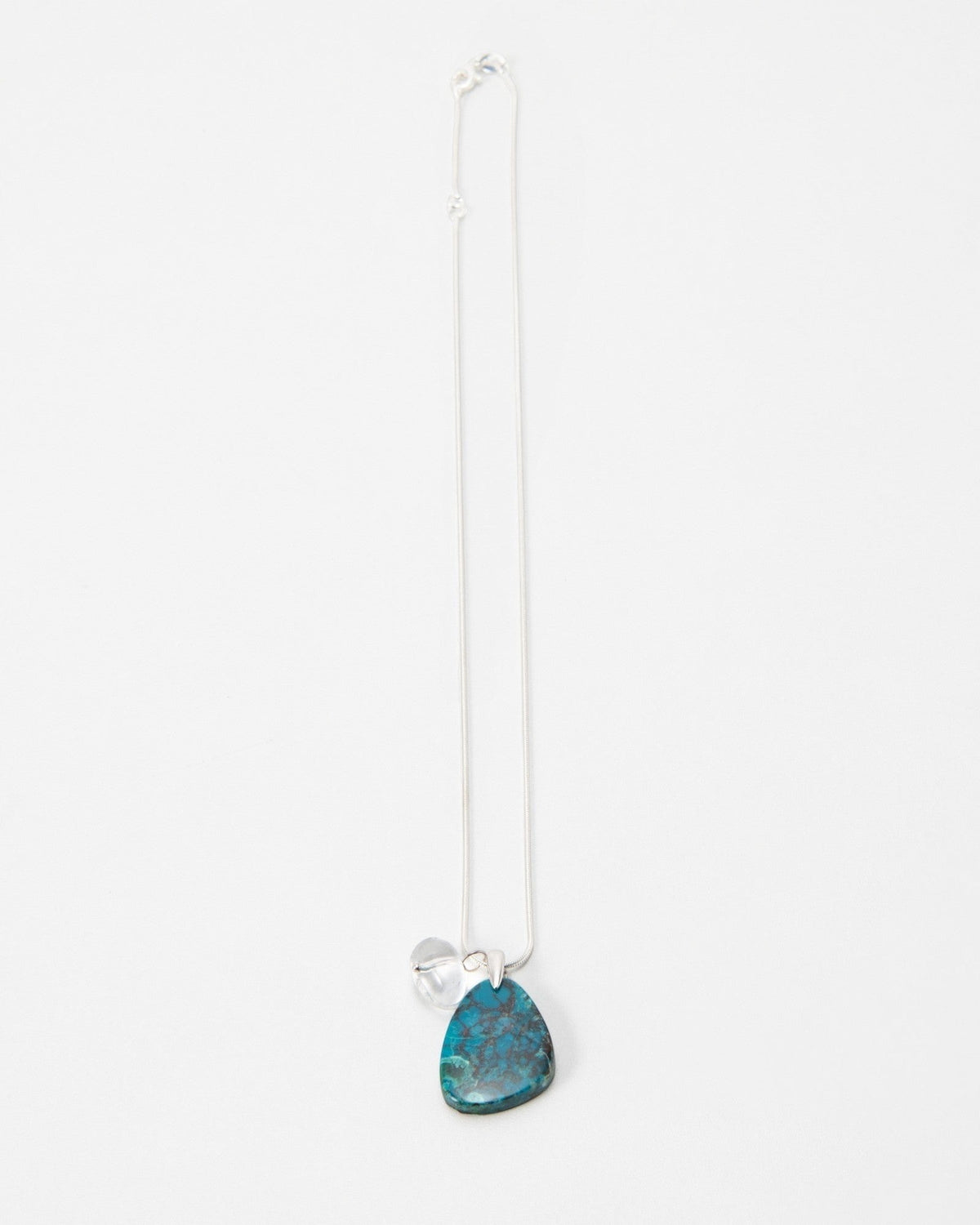 Elsita Jewelry Marine necklace featuring a teardrop-shaped blue and green stone pendant on a delicate silver chain
