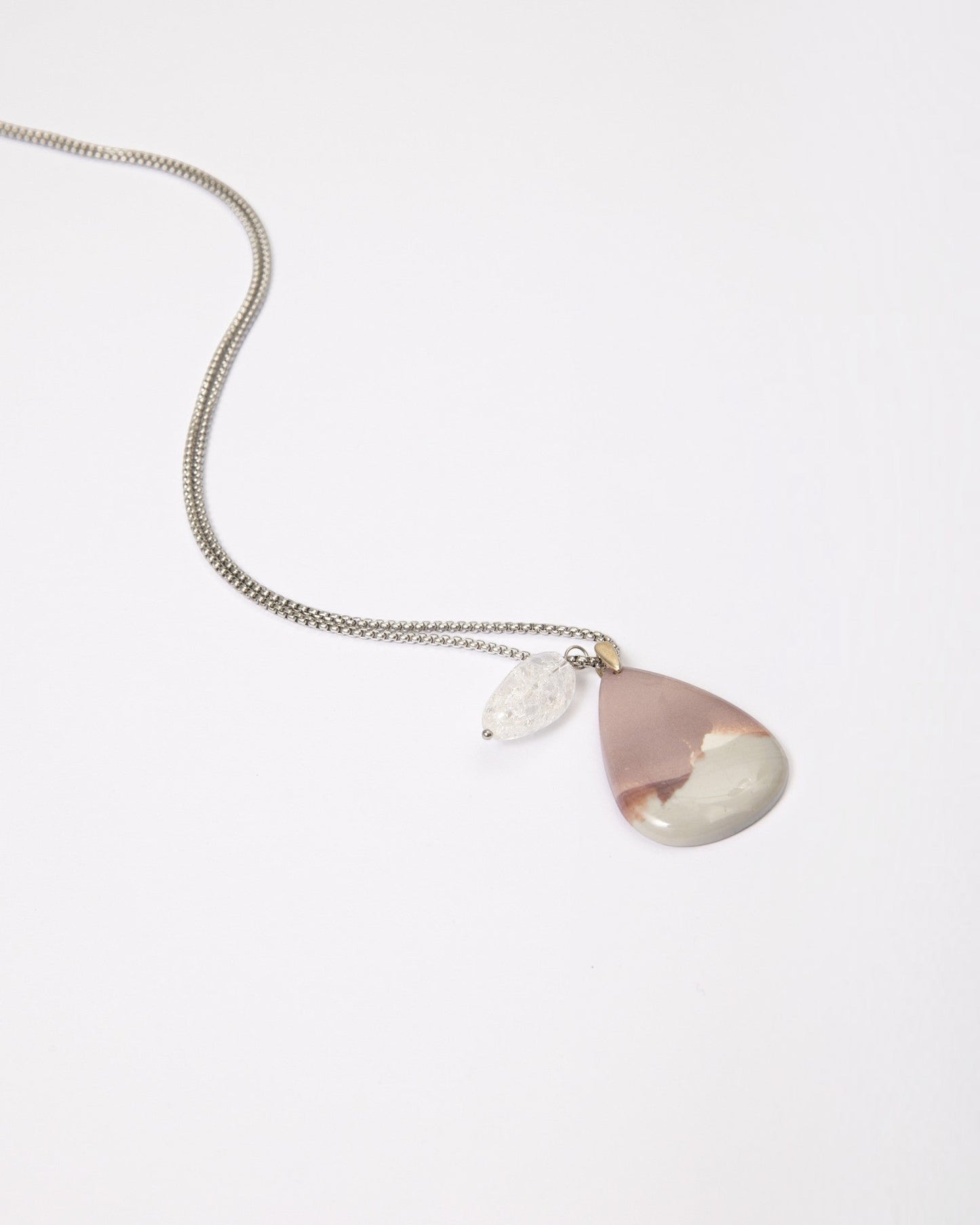Elsita Jewelry Mauve V pendant necklace featuring a teardrop Hyacinth Jasper stone and clear quartz on a silver chain.