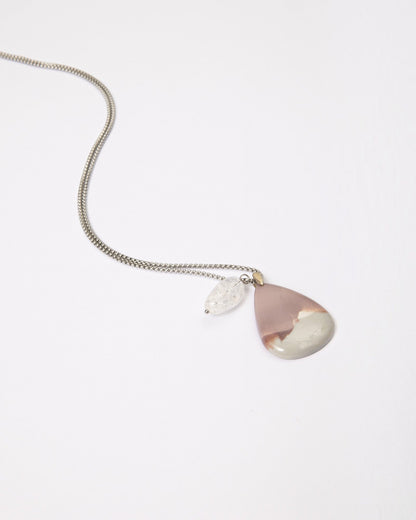 Elsita Jewelry Mauve V pendant necklace featuring a teardrop Hyacinth Jasper stone and clear quartz on a silver chain.