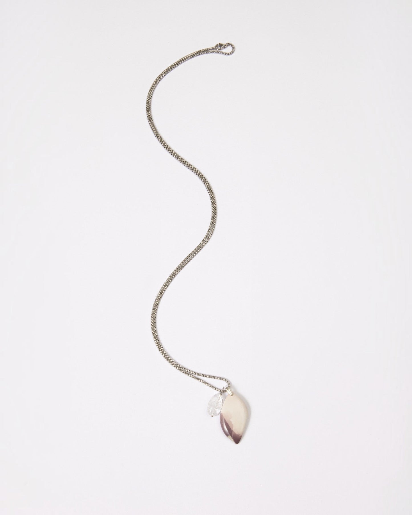 Elsita Jewelry Mauve IV necklace featuring a Hyacinth Jasper pendant and clear quartz on a sterling silver chain.
