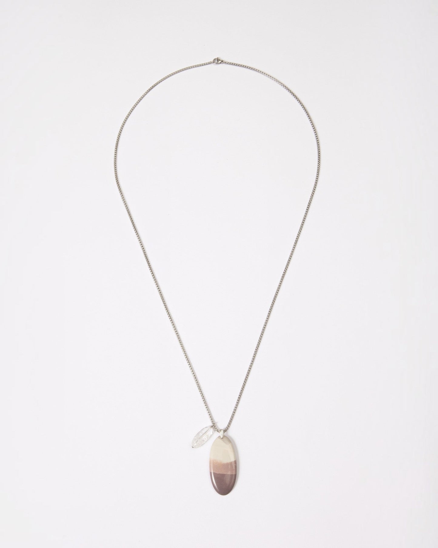 Elsita Jewelry Mauve I necklace featuring a smooth oval Hyacinth Jasper pendant in lavender and white on a silver chain